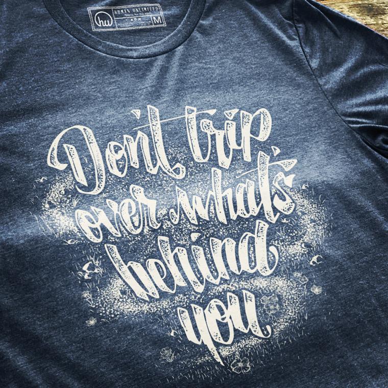 T-shirt - Don't Trip Over What's Behind You - Unisex